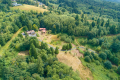 House and barn near the left